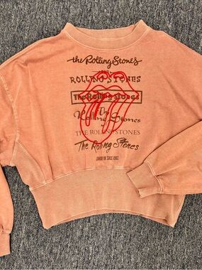 the Rolling Stones Cropped Sweatshirt in Peach with Red Tongue Graphic